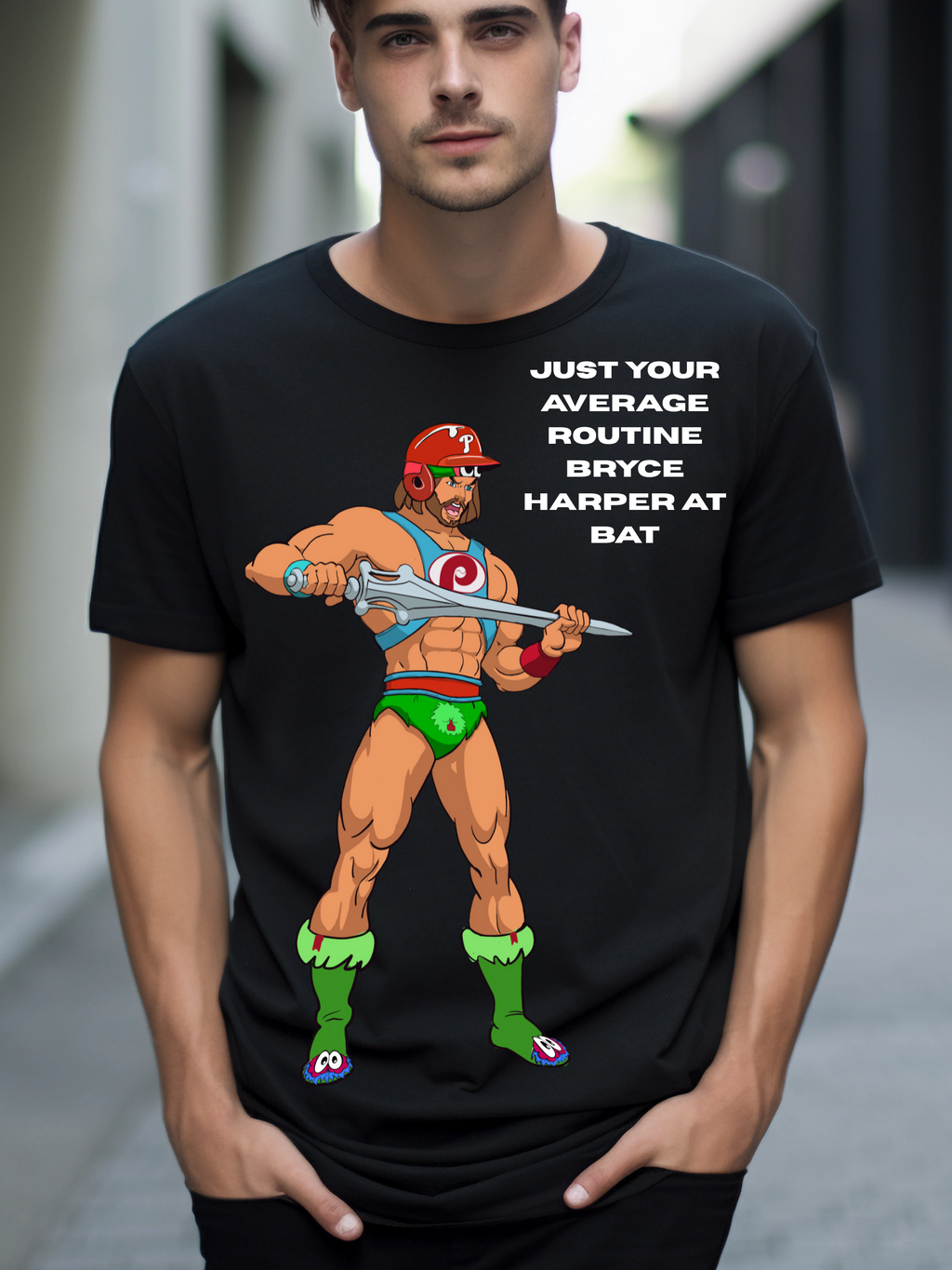 Illustration of a muscular cartoon character in green and red gear holding a sword, wearing a red baseball helmet with a 'P', on a black t-shirt with the phrase 'Just your average routine slugger at bat' – perfect for Philadelphia baseball fans