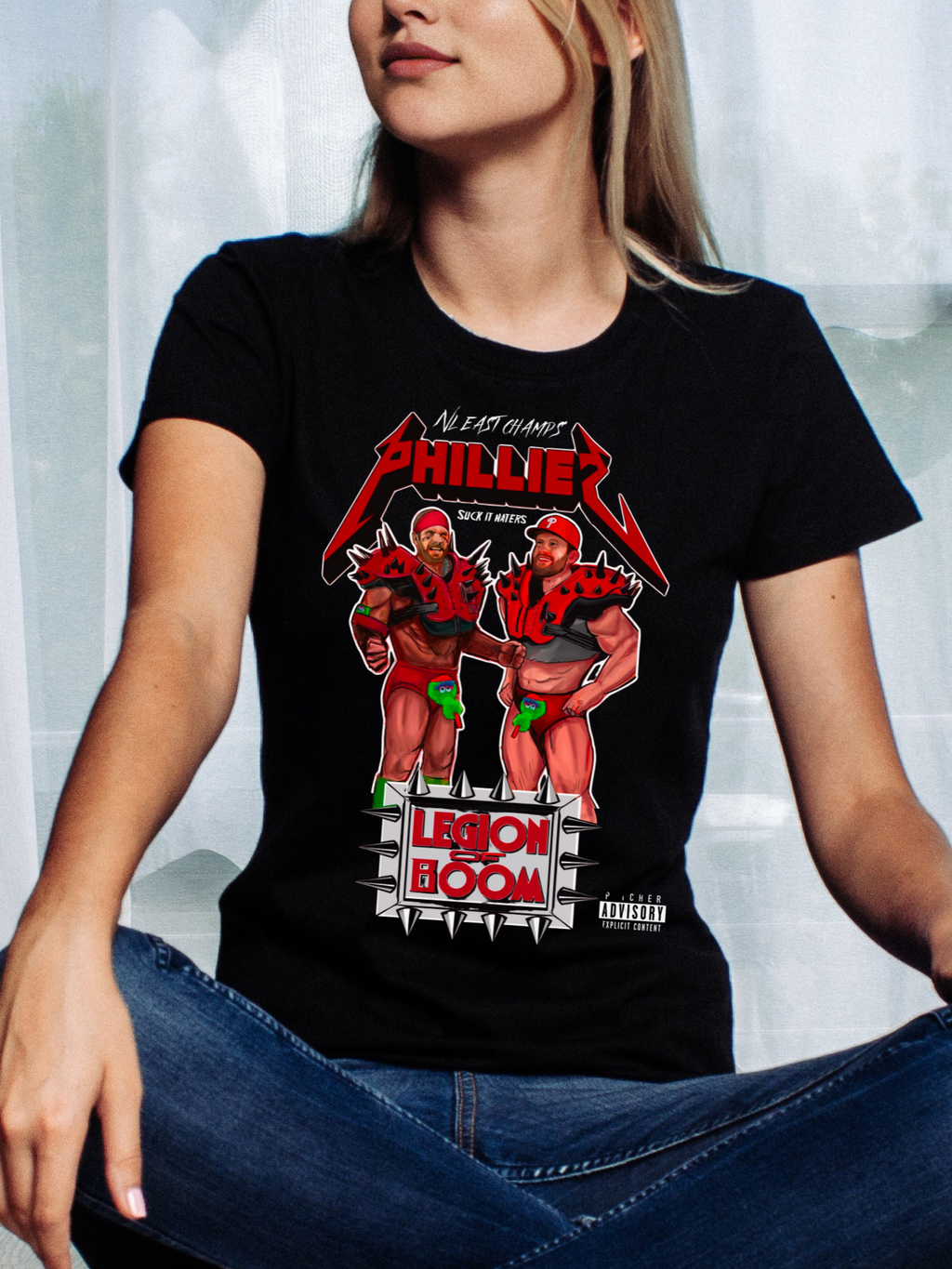 Lady wearing a black T-shirt with NL East Champs Legion of Boom graphic design